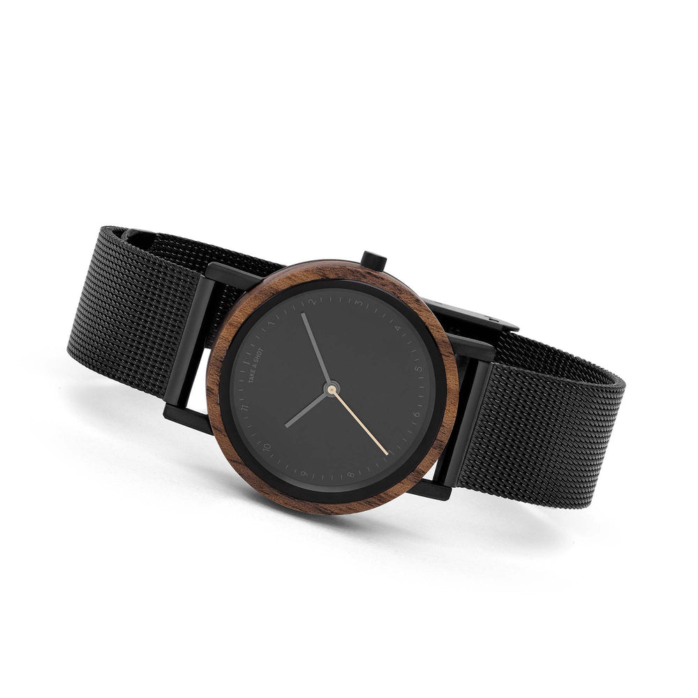 kleine damen holzuhr 30mm schwarz milanaise frontalansicht liv walnut take a shot liegende ansicht